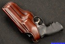Custom leather belt holsters for revolvers.